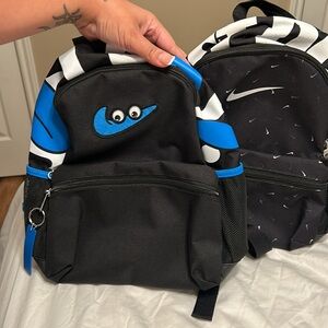 Two mini Nike Brasilia backpacks in EUC